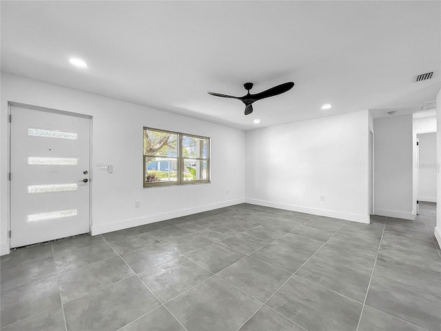 unfurnished living room featuring visible vents, ceiling fan, baseboards, recessed lighting, and tile patterned flooring