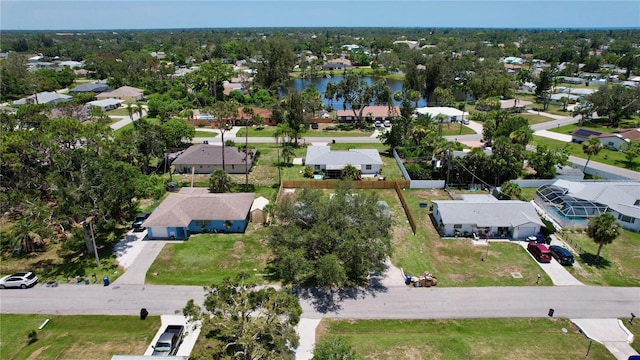 bird's eye view featuring a residential view and a water view