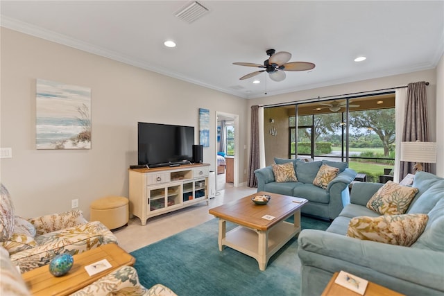 living room featuring ceiling fan, ornamental molding, and light colored carpet