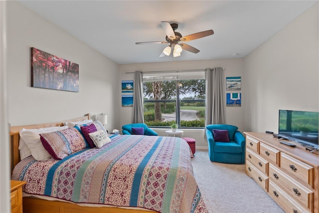 bedroom featuring ceiling fan and carpet flooring