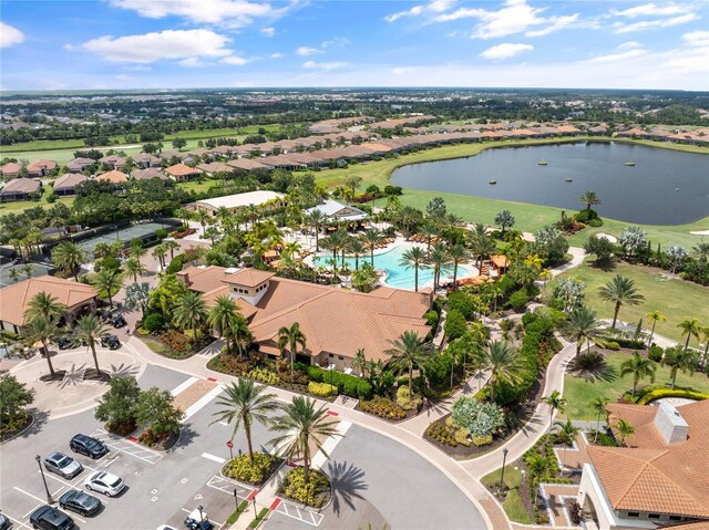 birds eye view of property featuring a water view