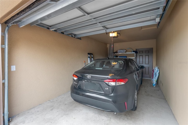 garage featuring a garage door opener