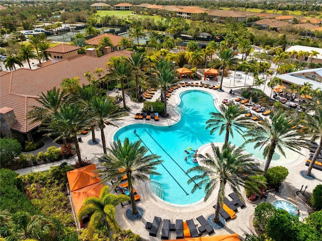 community pool with a patio