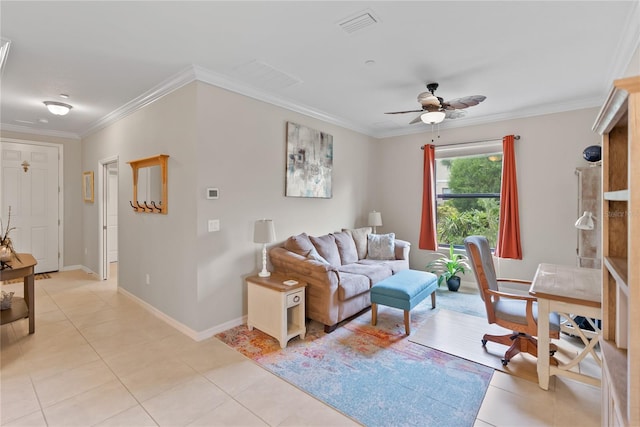 living room featuring light tile patterned flooring, visible vents, baseboards, a ceiling fan, and crown molding