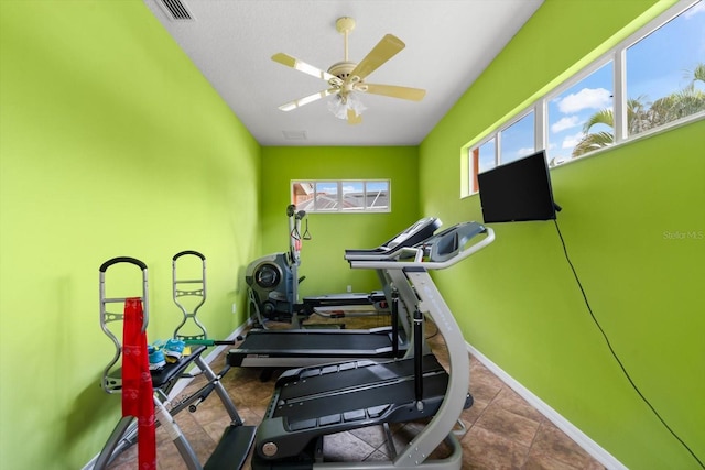 workout room with ceiling fan