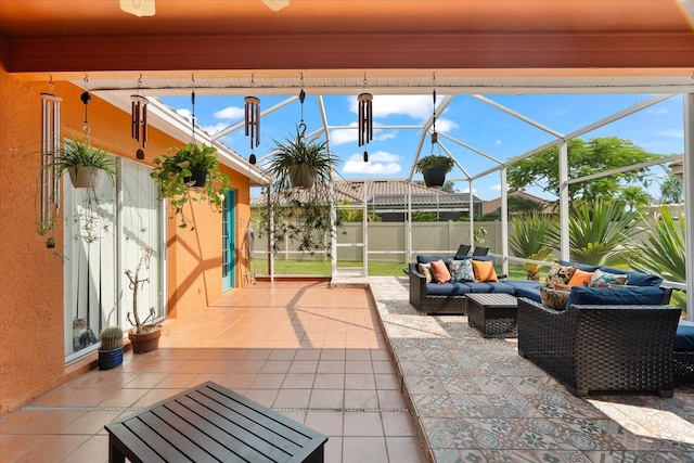 view of patio featuring glass enclosure and outdoor lounge area