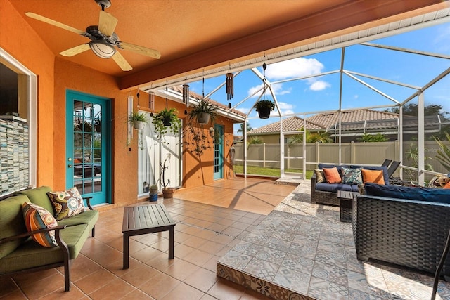 sunroom / solarium with ceiling fan