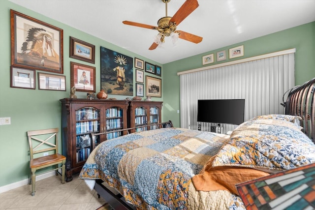 bedroom featuring ceiling fan and light tile patterned flooring