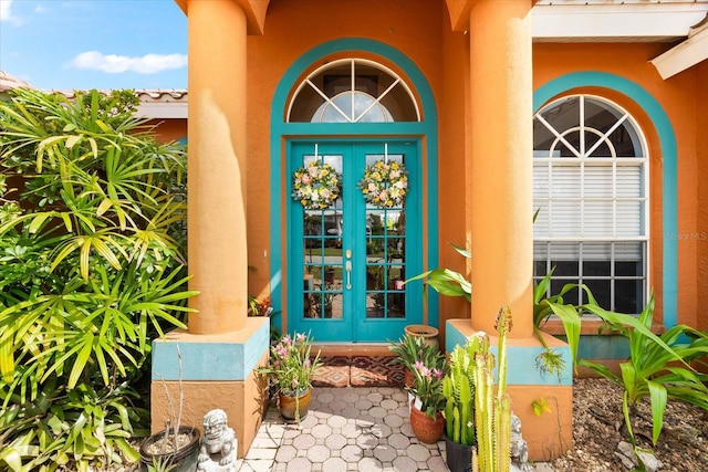 property entrance featuring french doors