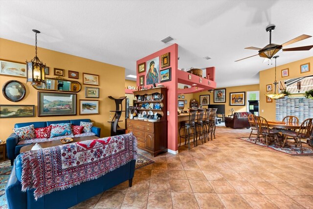 tiled bedroom with ceiling fan