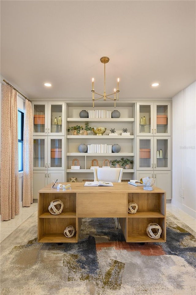 tiled office space with a chandelier