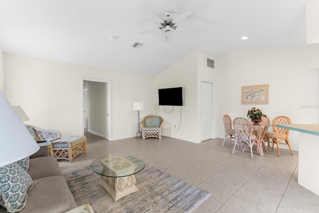 living room featuring high vaulted ceiling, ceiling fan, and light tile patterned flooring