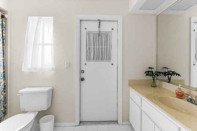 full bath with toilet, baseboards, and vanity