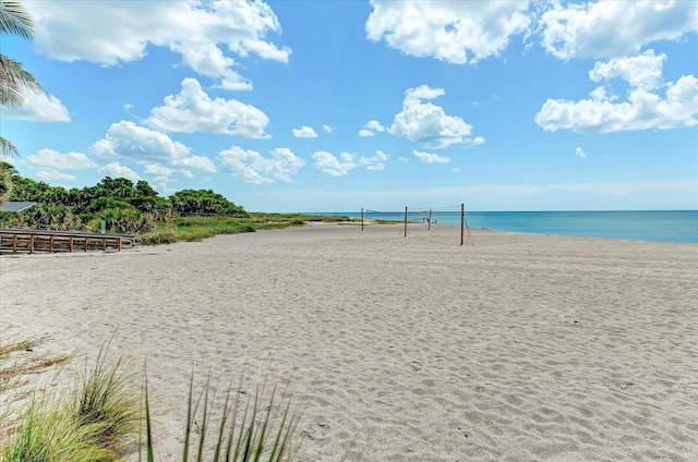 view of water feature with a beach view