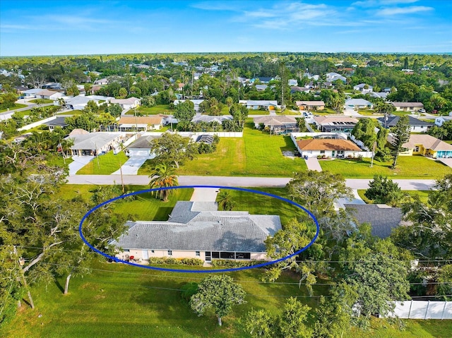 drone / aerial view with a residential view