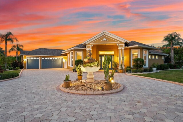 prairie-style house featuring a garage