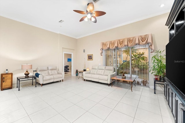 tiled living room with ceiling fan and ornamental molding