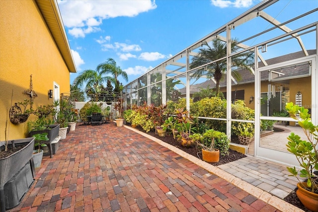 view of patio / terrace with a lanai