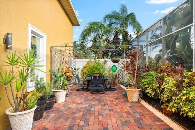 view of patio with a lanai