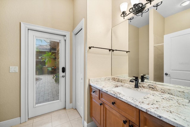 bathroom featuring vanity and tile patterned flooring