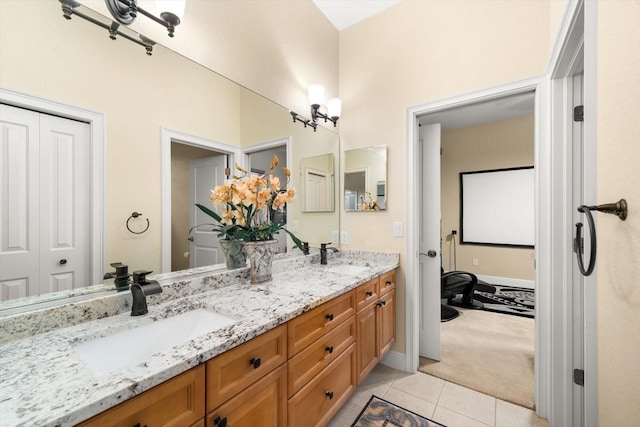 bathroom with tile patterned flooring and vanity