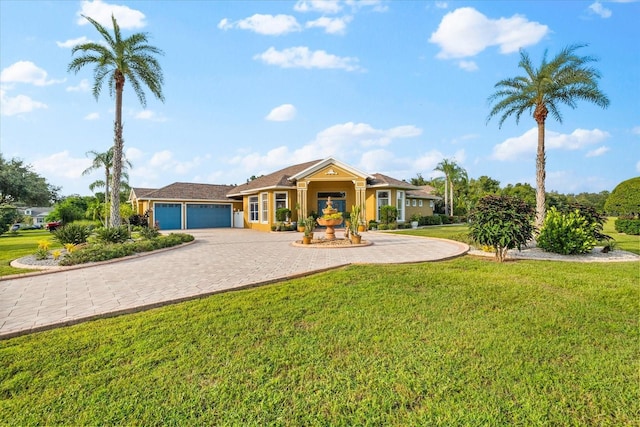 single story home with a front lawn and a garage