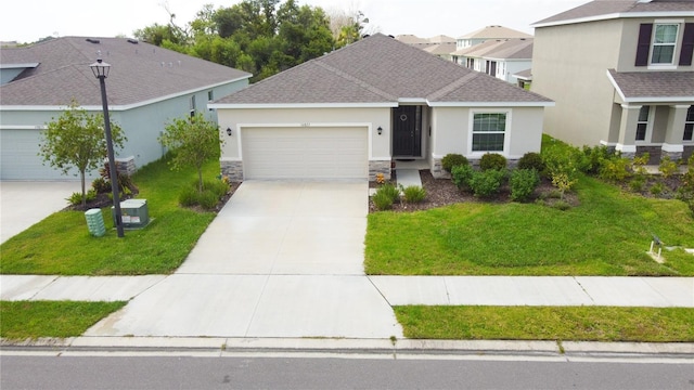 view of front of property with stone siding, driveway, a front lawn, and stucco siding