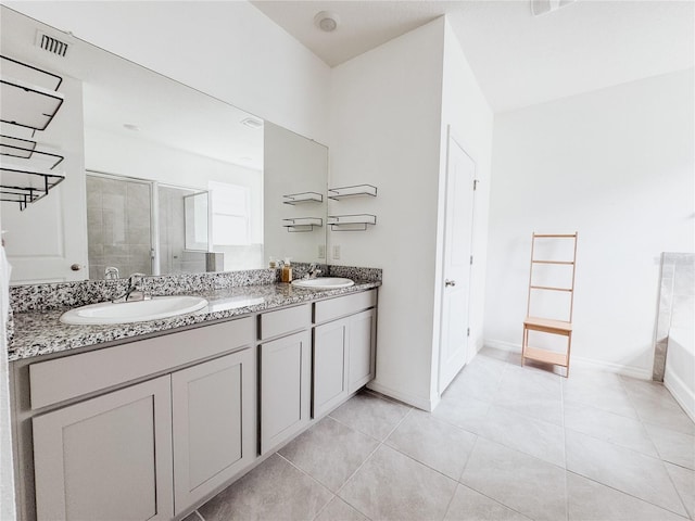 10827 Charlotte Dr, Parrish, FL 34219 - bathroom featuring visible vents, a sink, double vanity, and a shower stall