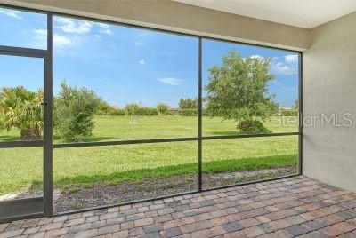 unfurnished sunroom featuring a wealth of natural light