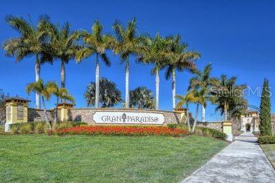 20635 Romagna Pl, Venice, FL 34293 - community sign featuring a yard