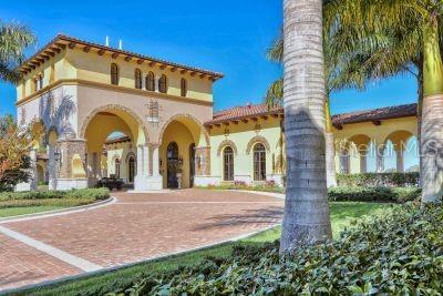 20635 Romagna Pl, Venice, FL 34293 - view of front of home with stucco siding