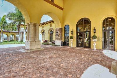20635 Romagna Pl, Venice, FL 34293 - view of patio / terrace with french doors