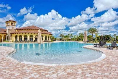 20635 Romagna Pl, Venice, FL 34293 - community pool featuring a patio area