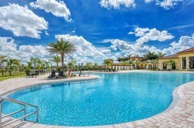 20635 Romagna Pl, Venice, FL 34293 - community pool featuring a patio