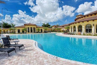 20635 Romagna Pl, Venice, FL 34293 - community pool featuring a patio