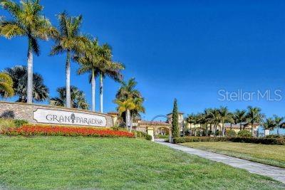 20635 Romagna Pl, Venice, FL 34293 - community / neighborhood sign featuring a lawn