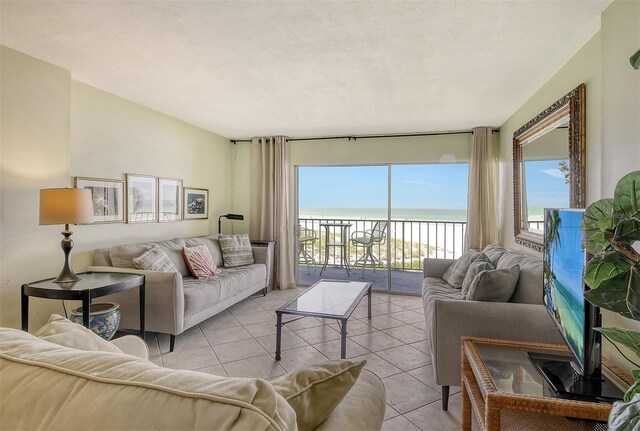 19 Whispering Sands Dr Unit 204, Sarasota, FL 34242 - living area featuring light tile patterned floors