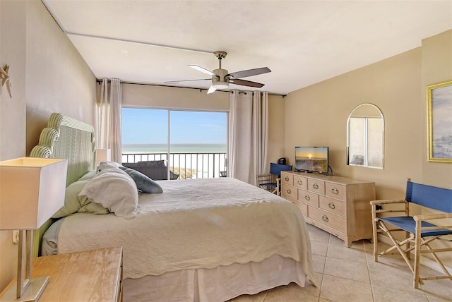 bedroom featuring ceiling fan, light tile patterned floors, and access to outside