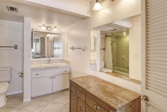 full bathroom featuring tile patterned flooring, toilet, vanity, and shower / tub combo