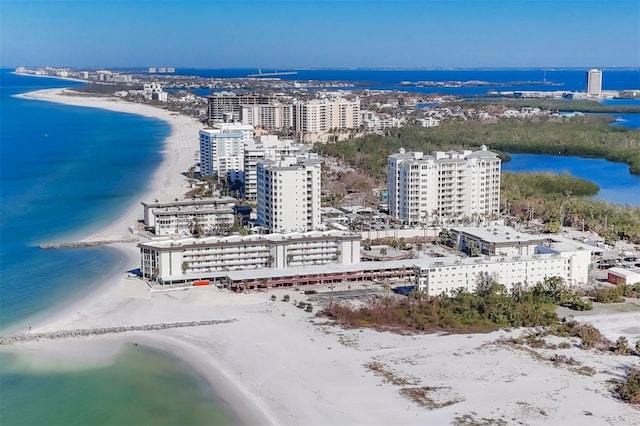 aerial view featuring a view of the beach and a water view