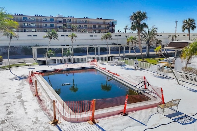 view of swimming pool featuring a patio