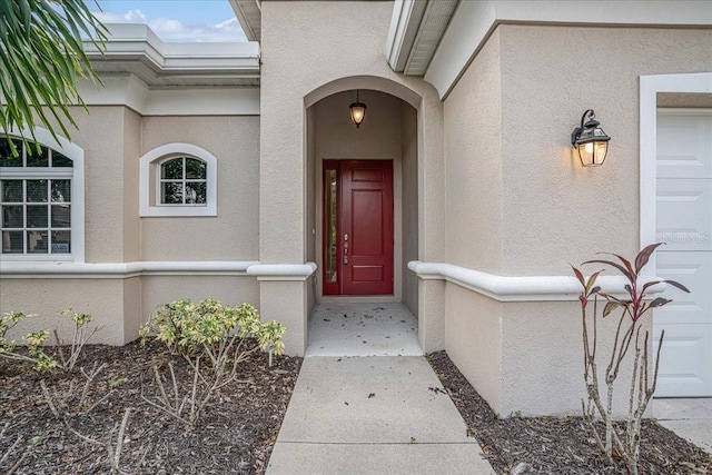 entrance to property featuring a garage