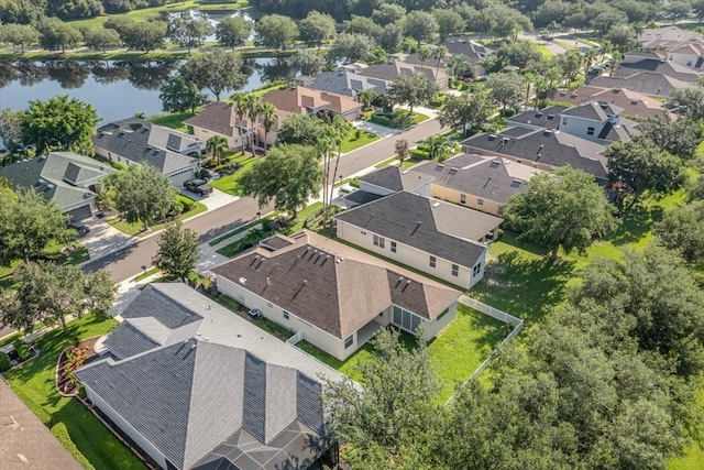 bird's eye view with a water view