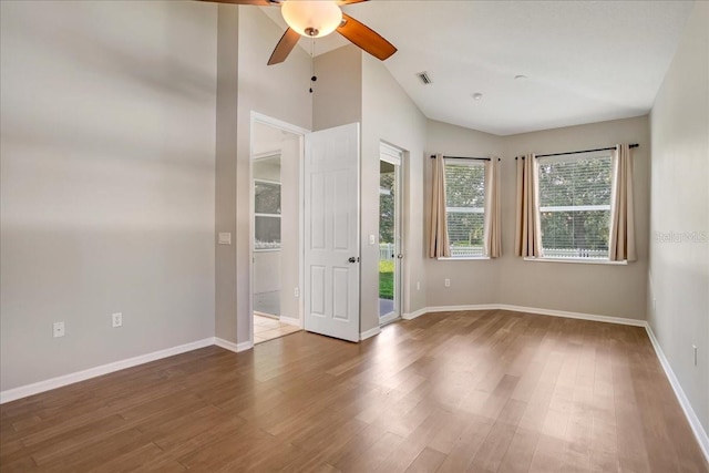 unfurnished room with ceiling fan and wood-type flooring