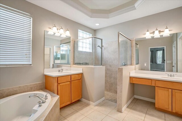 bathroom with tile patterned flooring, crown molding, and vanity