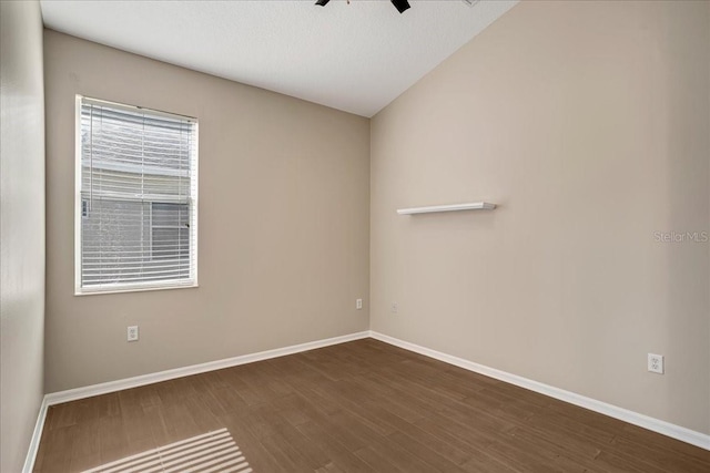 unfurnished room featuring ceiling fan, vaulted ceiling, and hardwood / wood-style floors