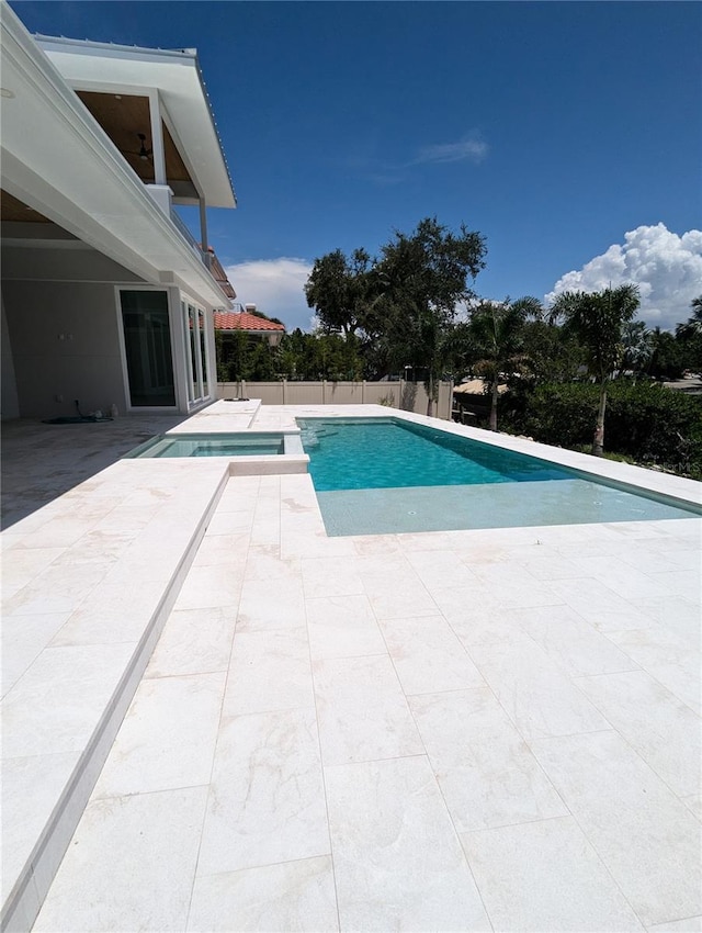 view of pool featuring a patio