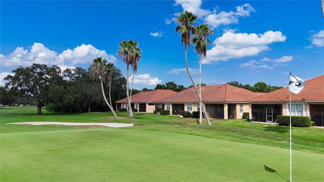 view of community featuring a lawn