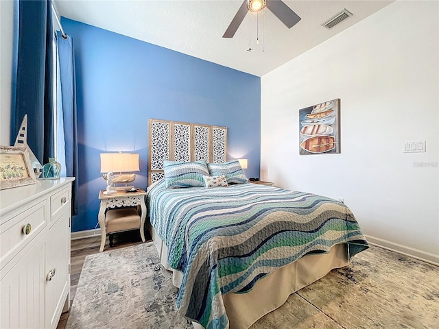 bedroom featuring hardwood / wood-style flooring and ceiling fan