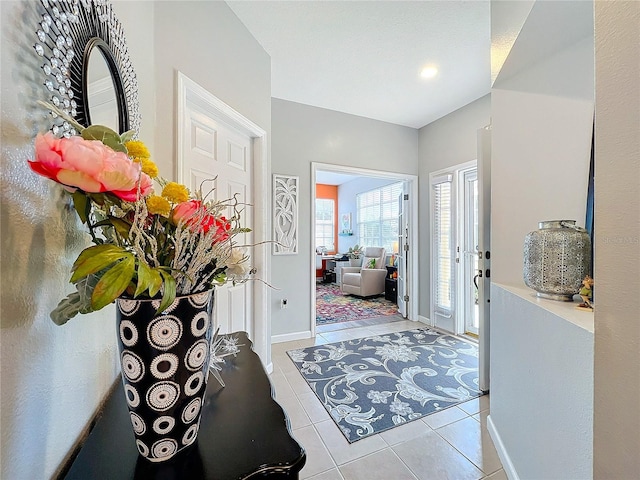 entrance foyer with light tile patterned floors